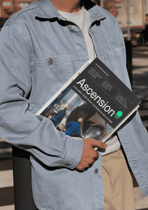 Person holding magazine